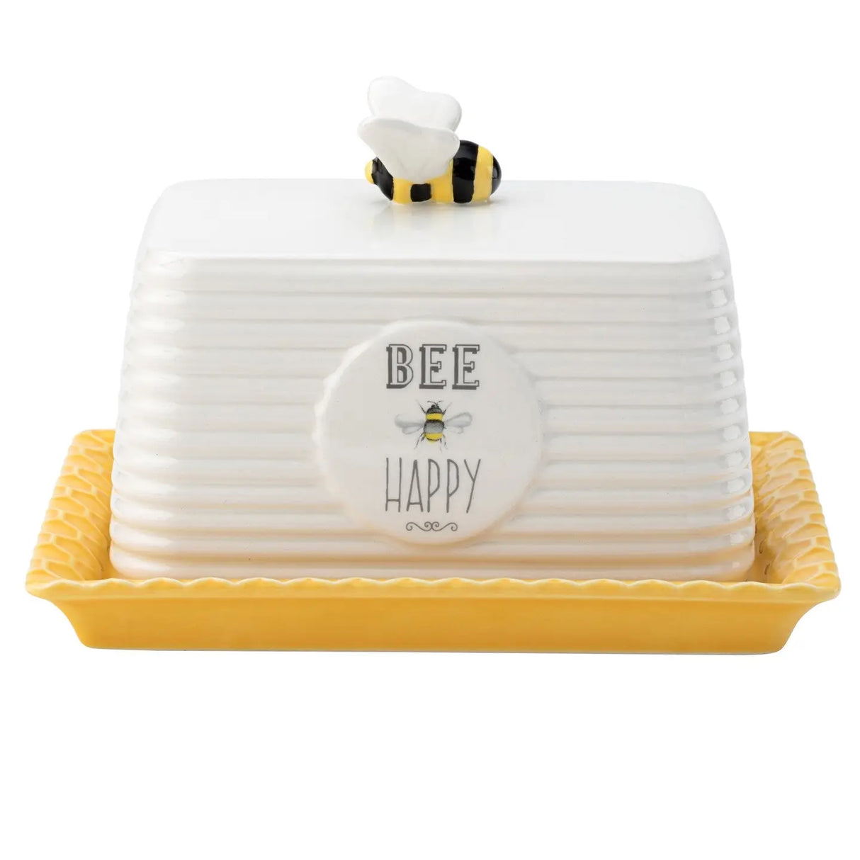 A ceramic white butter dish with the words Bee Mine on the front and a ceramic bee on the top