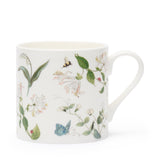 A white fine bone china mug decorated with a delicate botanical pattern of green leaves, white flowers, a blue butterfly, and a small bee, shown on a clean white background.
