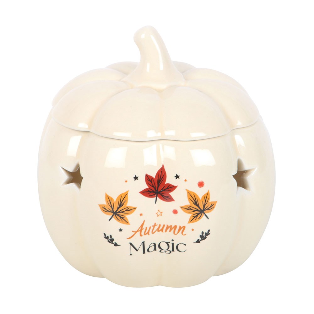 Ceramic pumpkin-shaped wax burner with autumn-themed design on a white background