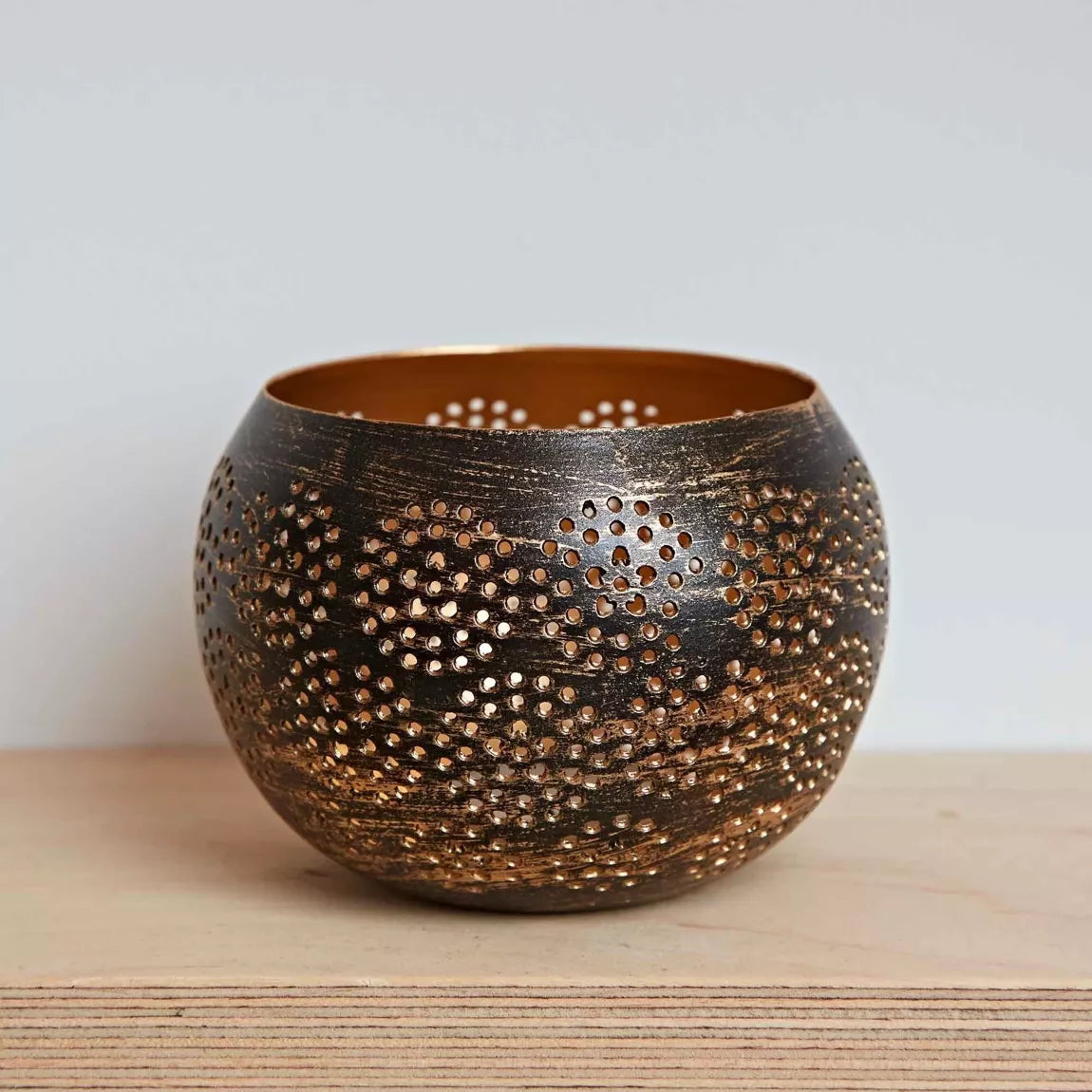 Black and Gold Metal Tea Light Holder Warm Ambient Starburst